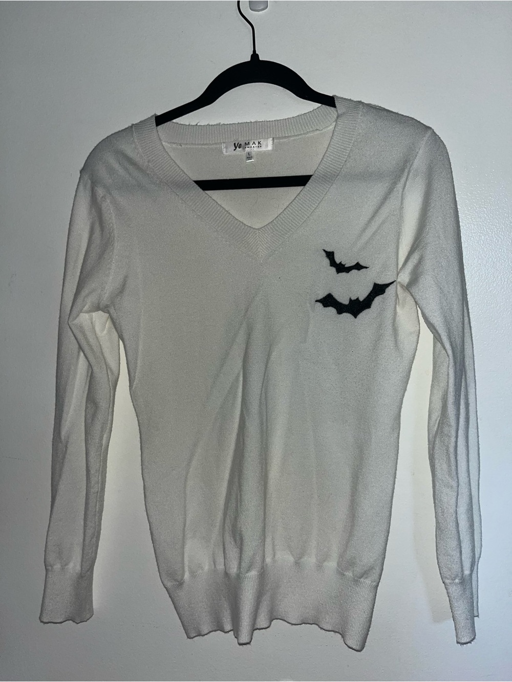 Vero Moda Cream V-Neck Sweater with Black Bat Appliqués